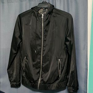 Black windbreaker